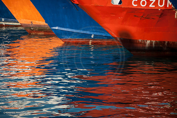 Boat reflections on water, San Miguel de Cozumel, Quintana Roo