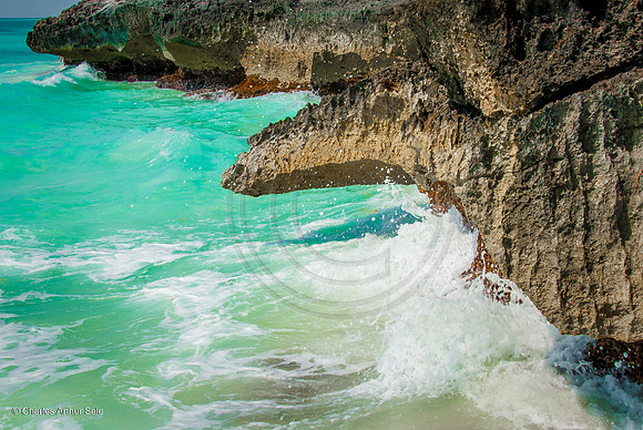 Surf beneath Templo del Viento, Maya ruins at Tulum