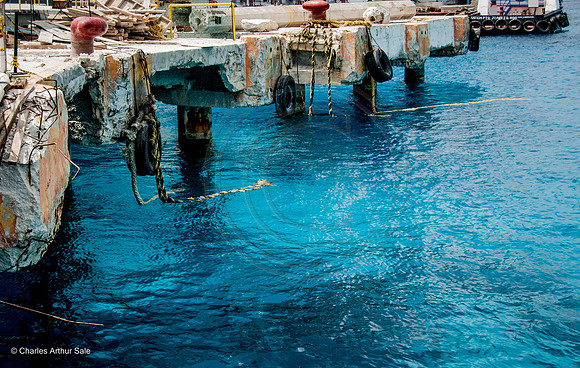 Pylons and rigging of demolished moorings in harbor of San Miguel de Cozumel. Quintana Roo
