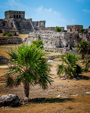 Casa de las Columnas (foreground), El Castillo (background left), Templo de la Serie Inicial (background right) among Maya ruins at Tulum